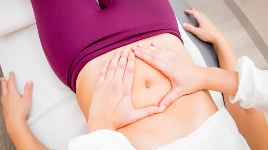 Pelvic health physical therapy assessment in progress with a healthcare professional.