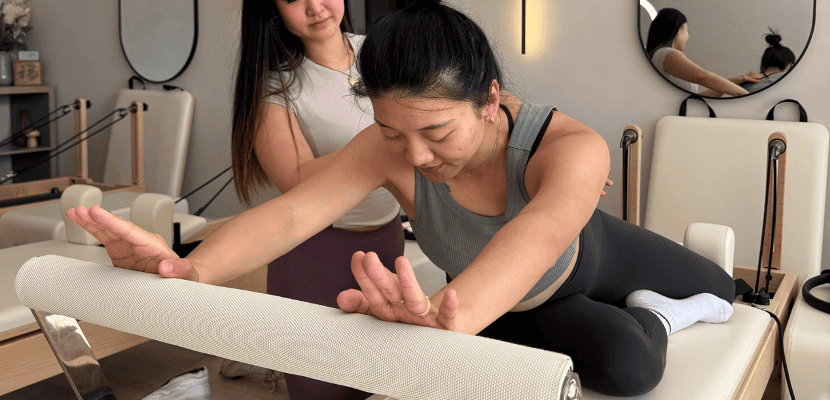 A woman receiving pelvic floor physiotherapy after childbirth in a clinic setting.
